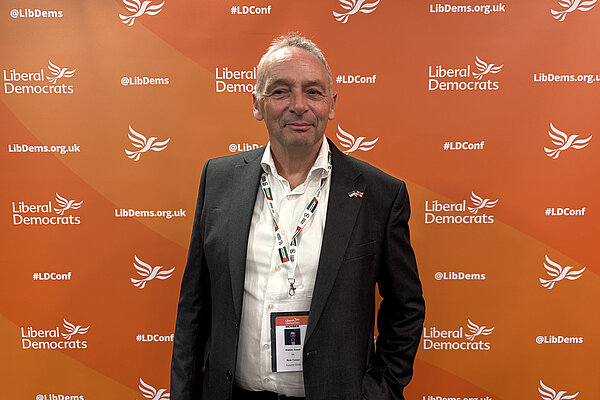 aidan reed on an orange background