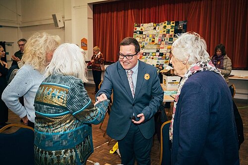 Jack Davies thanks Sway Place resident, Charmian Vilvien, for her contribution to the Quilt.